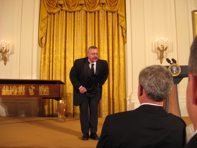 Joe portraying Roosevelt on stage with President George W. Bush at the White House in 2008